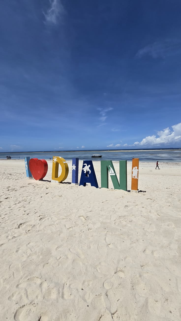 Diani Beach Kenya Indian Ocean with white sand and palm trees