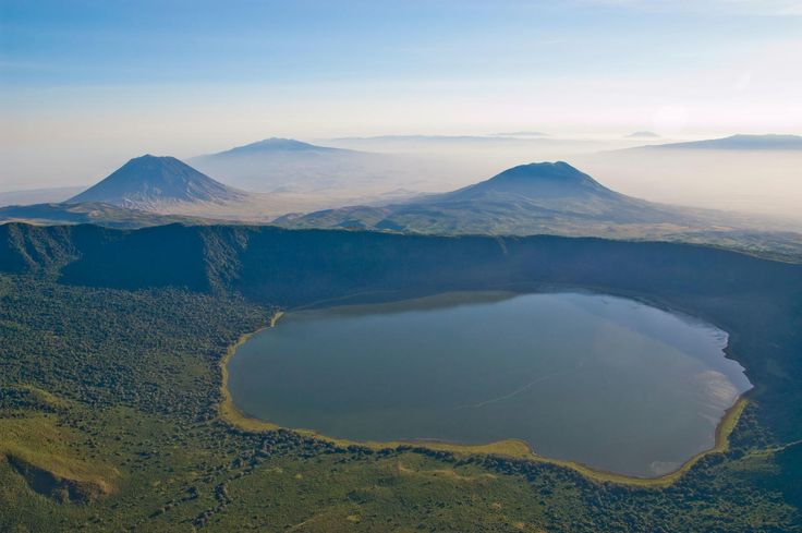 Ngorongoro Crater Tanzania with wildlife and green floor